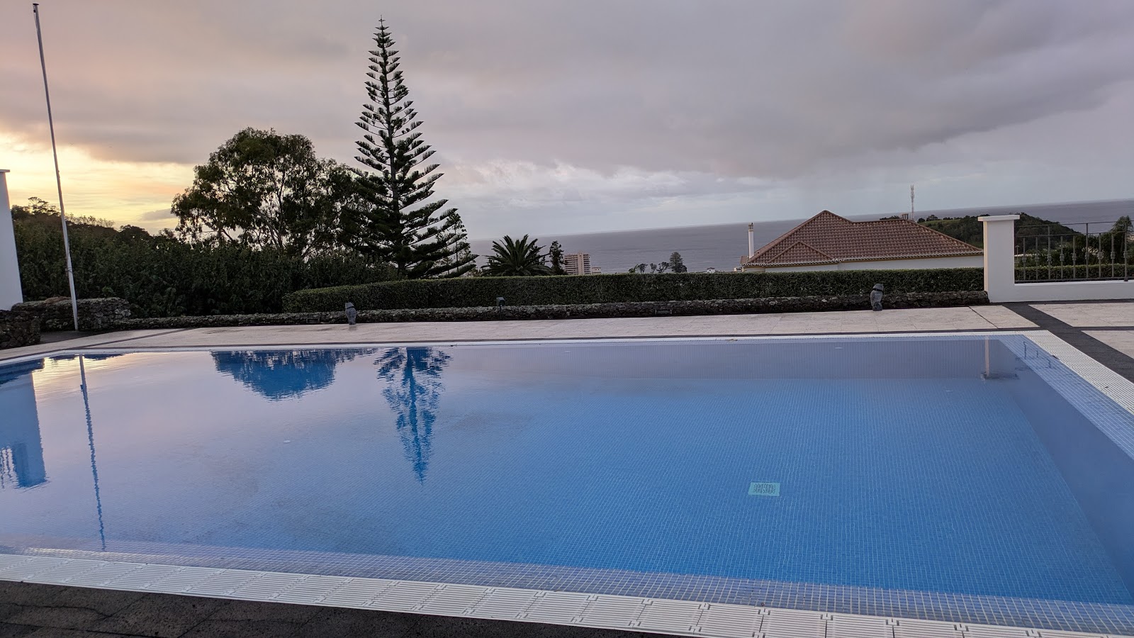 Wood deck and glass railing facing the São Miguel coast