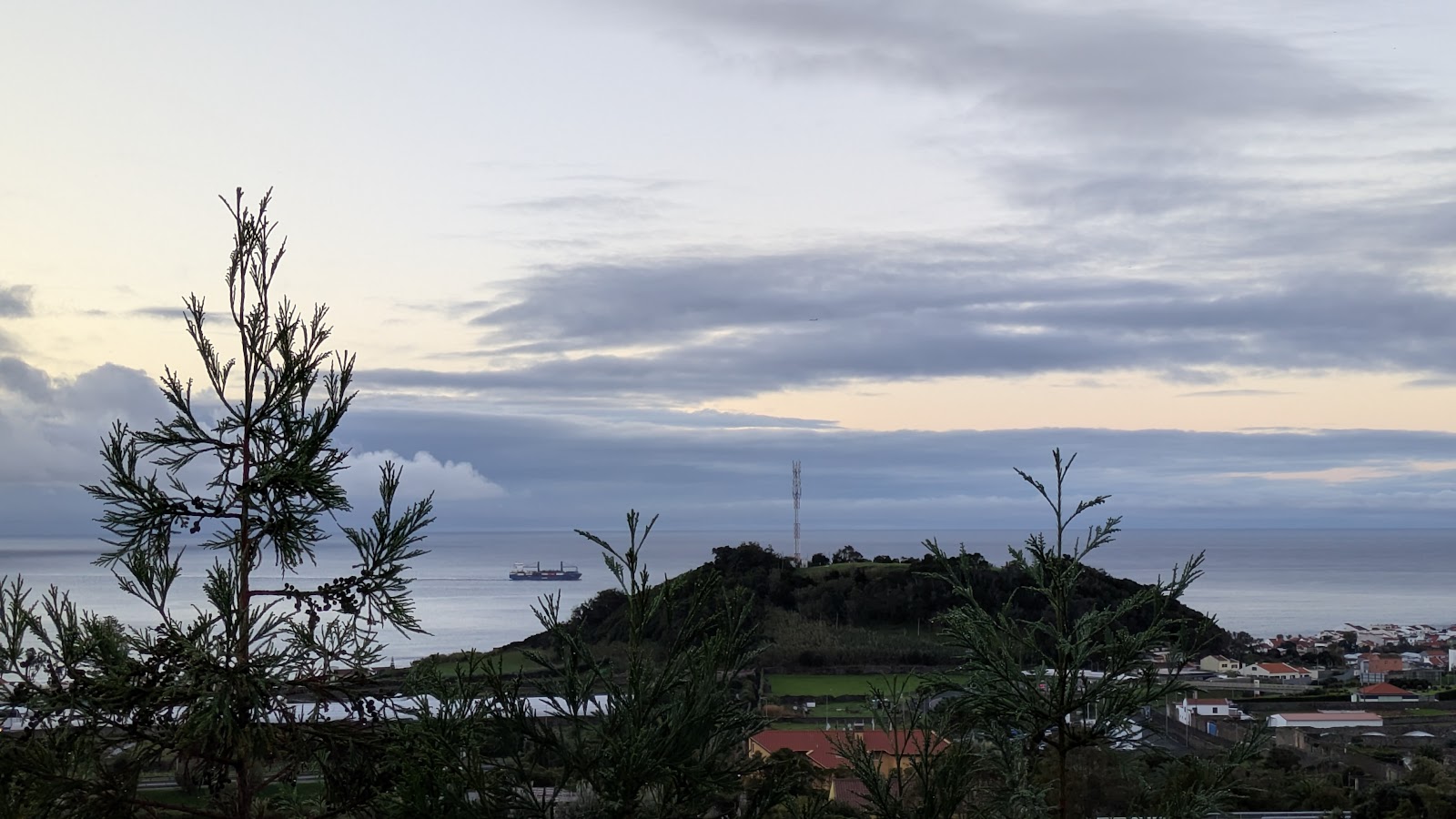 Terrace seating with countryside and sea views